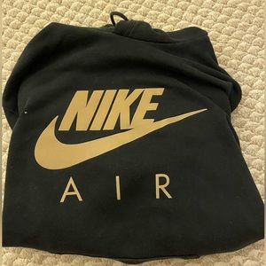 Medium women’s Nike air Jordan black and gold hoodie